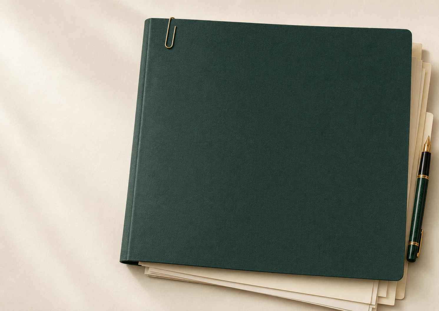 A deep green mortgage case file with lender documents and a pen